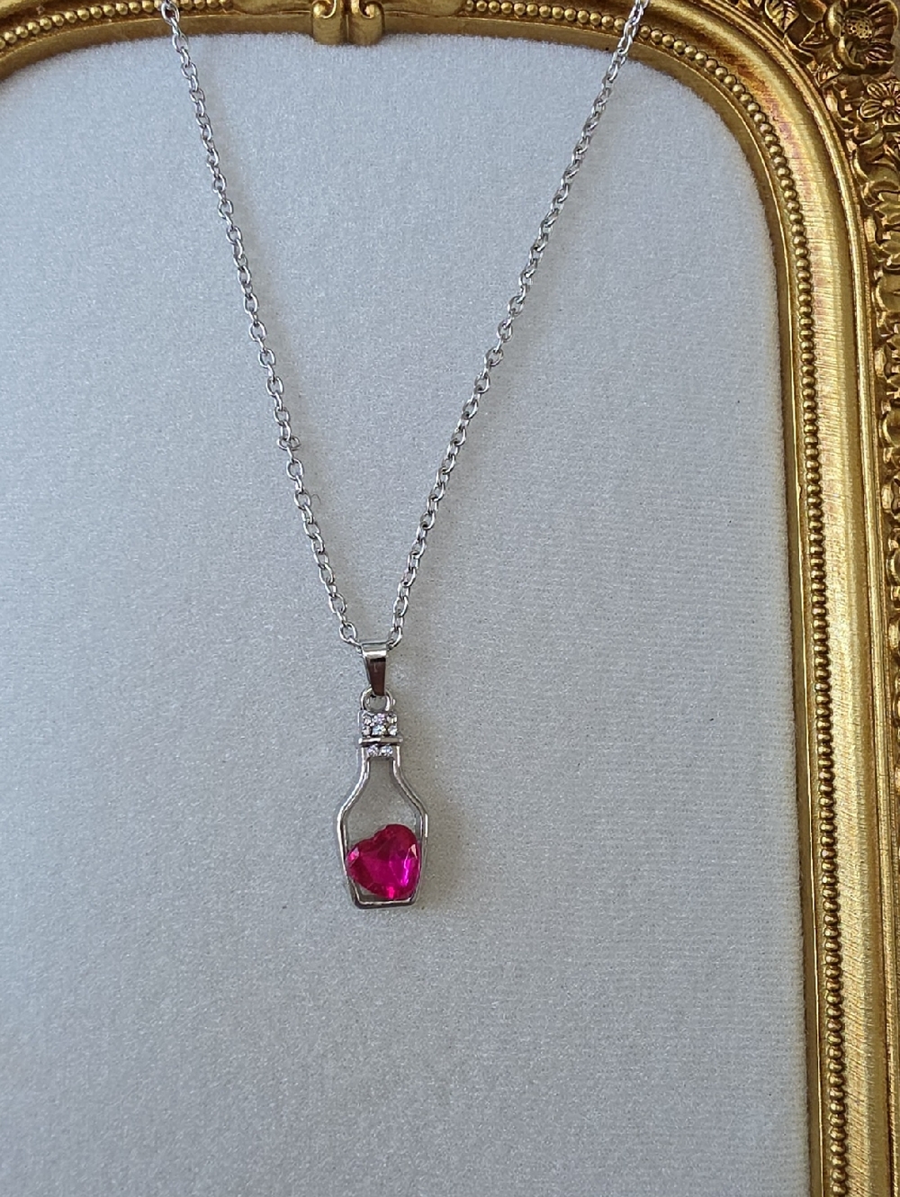 Pendant Necklace with Pink Gemstone Bottle
